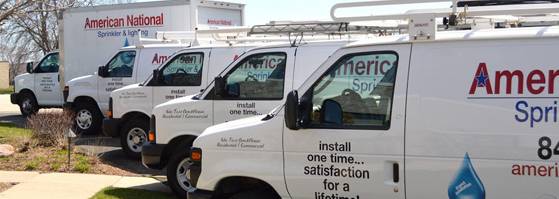 Fleet of vans ready to install a commercial sprinkler syste,m.