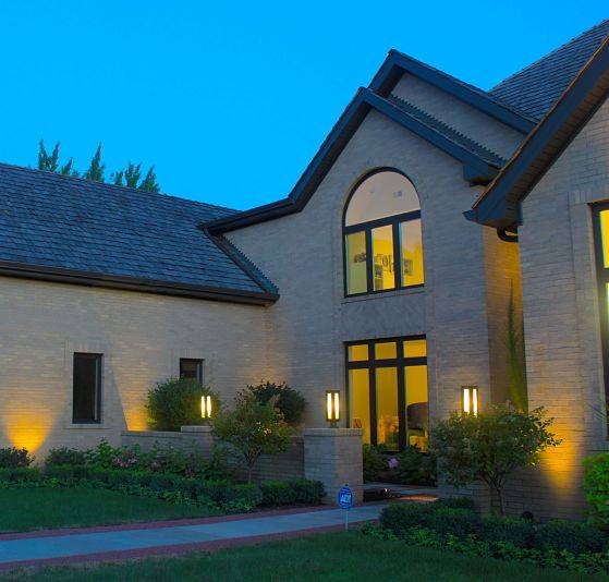 This is the front of a house with Northbrook landscape lighting.