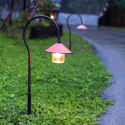 Outdoor accent lighting can brighten up a pathway.