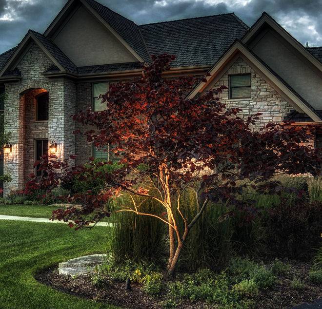 Automatic home exterior lighting system installed by American National Sprinkler & Lighting.