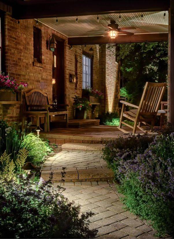 American National Sprinkler & Lighting - this pathway to a Highland Park home has Highland Park landscape lighting in the front.