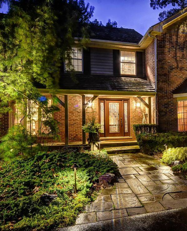 American National Sprinkler & Lighting - Lake Forest landscape lighting on a pathway for a Lake Forest home.