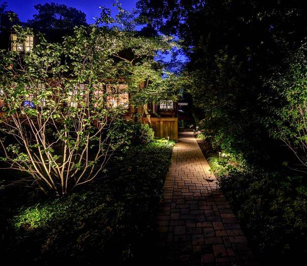 American National Sprinkler & Lighting - a home in Libertyville, IL with an outdoor landscape lighting and pathway lighting.