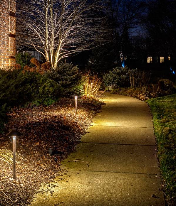 American National Sprinkler & Lighting - Cary Landscape Lighting - pathway lighting can illuminate pathways and the front of your home.